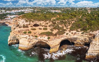 Aerial view of Benagil Cave showing the oculus from the clifftop