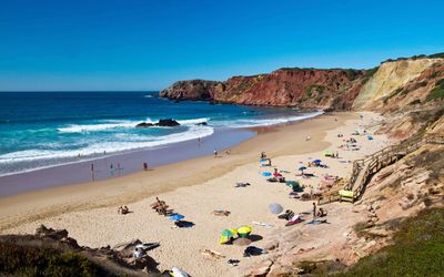 Beginner-friendly beach breaks at Praia do Amado