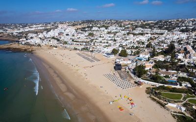 Aerial view of Praia da Luz looking west across the beach and low-rise village