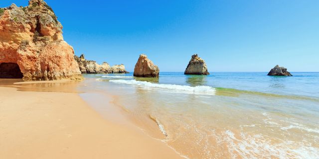 Praia dos Três Irmãos - Rock stacks, sea caves, and hidden coves between Alvor and Portimão