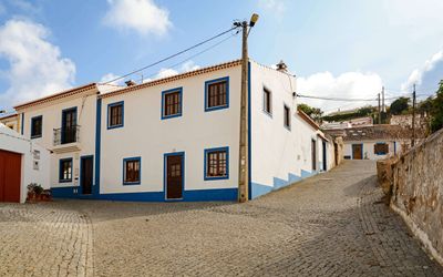 Traditional whitewashed houses in the village of Carrapateira
